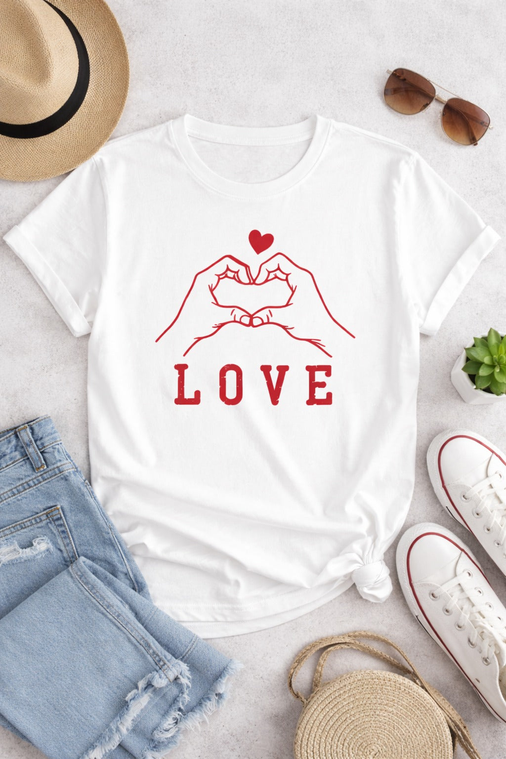 A white T-shirt with a “Love” print for women is the perfect mix of simplicity and expression.