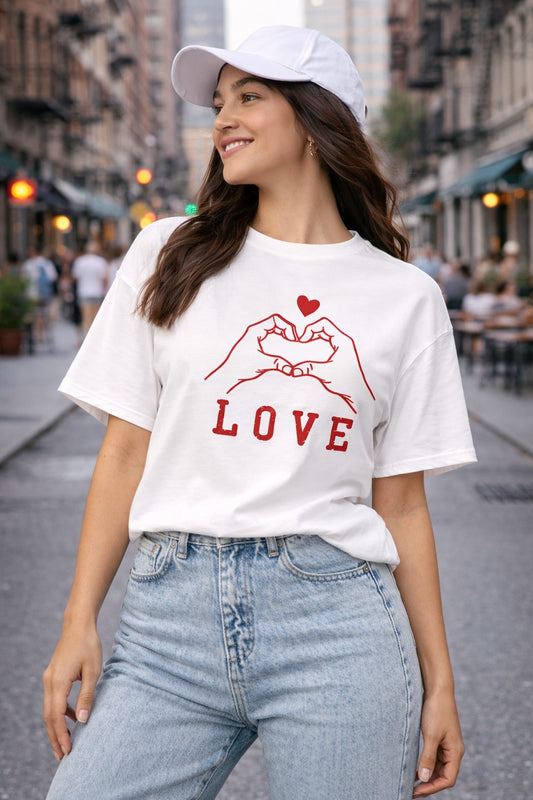 A white T-shirt with a “Love” print for women is the perfect mix of simplicity and expression.